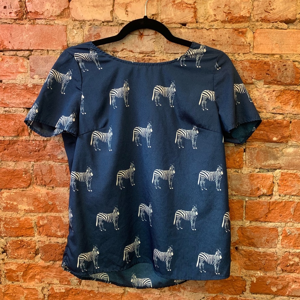 Dark blue blouse with zebras